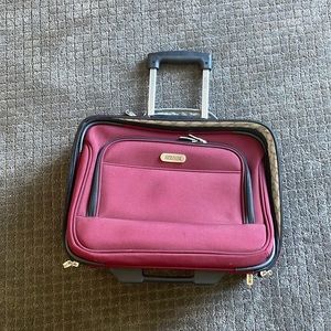 Kennith Cole rolling carry on weekender bag/toiletries bag. Used once!